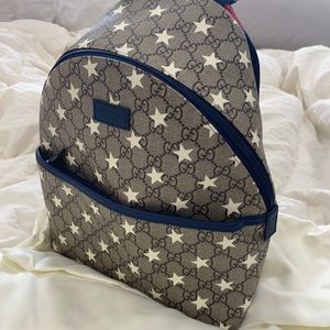 Gucci GG Supreme Stars print backpack